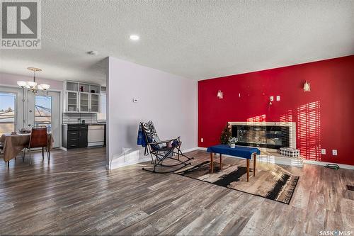 230 Ash Street, Outlook, SK - Indoor Photo Showing Living Room With Fireplace