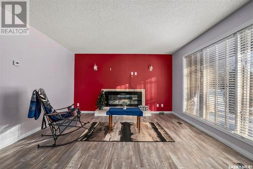 230 Ash Street, Outlook, SK - Indoor Photo Showing Other Room With Fireplace