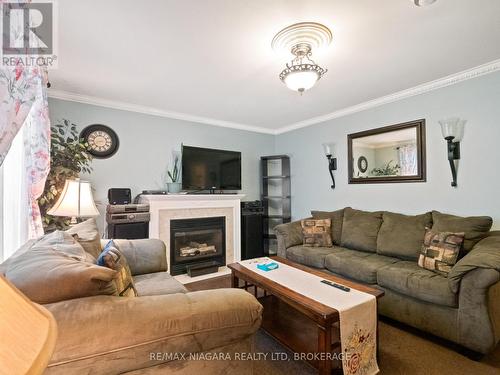 62 Douglas Street, Fort Erie (332 - Central), ON - Indoor Photo Showing Living Room With Fireplace