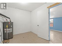 Room with HWT and Entrance to Back Room - 