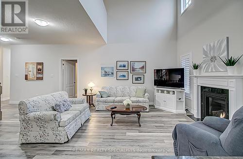 4 Alamode Road, Brampton, ON - Indoor Photo Showing Living Room With Fireplace