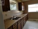 525 3Rd Avenue E, Unity, SK  - Indoor Photo Showing Kitchen With Double Sink 