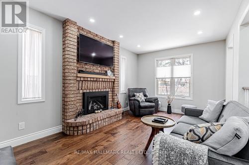 66 Stratton Crescent, Whitby, ON - Indoor Photo Showing Living Room With Fireplace