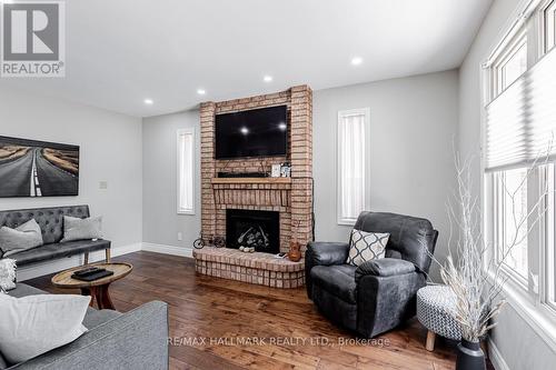 66 Stratton Crescent, Whitby, ON - Indoor Photo Showing Living Room With Fireplace