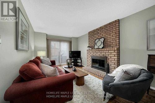 109 Major Wm Sharpe Drive, Brampton, ON - Indoor Photo Showing Living Room With Fireplace