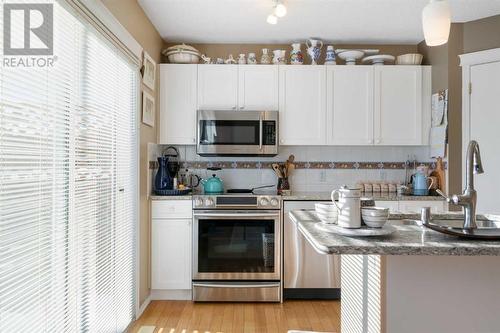 149 Tuscany Drive Nw, Calgary, AB - Indoor Photo Showing Kitchen