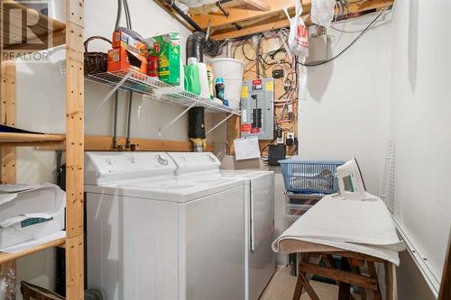 149 Tuscany Drive Nw, Calgary, AB - Indoor Photo Showing Laundry Room