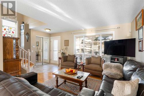 149 Tuscany Drive Nw, Calgary, AB - Indoor Photo Showing Living Room