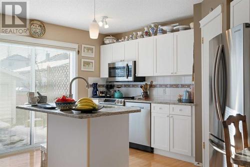 149 Tuscany Drive Nw, Calgary, AB - Indoor Photo Showing Kitchen