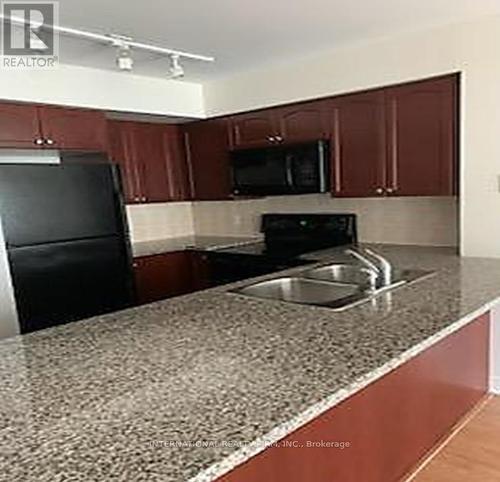 520 - 51 Lower Simcoe Street, Toronto, ON - Indoor Photo Showing Kitchen With Double Sink