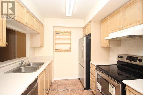 711 - 238 Doris Avenue, Toronto, ON - Indoor Photo Showing Kitchen With Double Sink