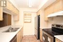 711 - 238 Doris Avenue, Toronto, ON  - Indoor Photo Showing Kitchen With Double Sink 