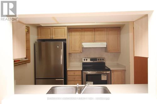 711 - 238 Doris Avenue, Toronto, ON - Indoor Photo Showing Kitchen With Double Sink