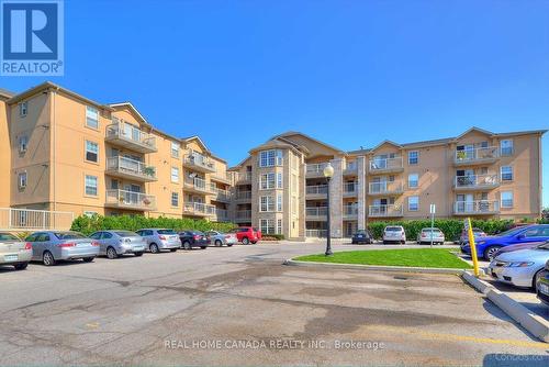 304 - 1490 Bishops Gate, Oakville, ON - Outdoor With Balcony With Facade