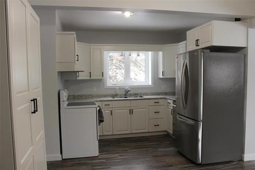 7068 138Nw Road Nw, Fisher Branch, MB - Indoor Photo Showing Kitchen With Double Sink