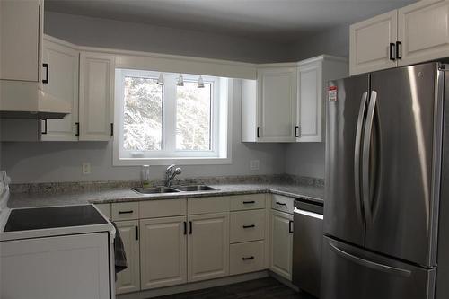 7068 138Nw Road Nw, Fisher Branch, MB - Indoor Photo Showing Kitchen With Double Sink