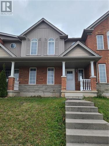 View of front of property with a porch - 529 Victoria Road N, Guelph, ON - Outdoor With Facade