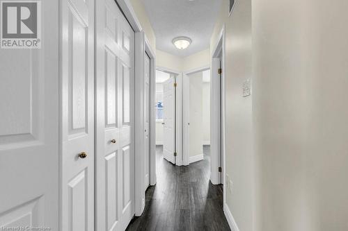 Corridor with a textured ceiling and dark wood-type flooring - 529 Victoria Road N, Guelph, ON - Indoor Photo Showing Other Room