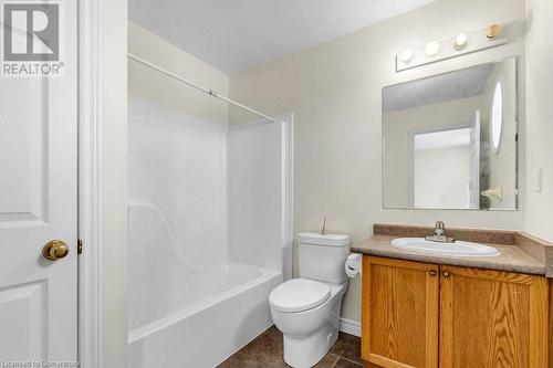 Full bathroom with tile patterned flooring, vanity, tub / shower combination, and toilet - 529 Victoria Road N, Guelph, ON - Indoor Photo Showing Bathroom