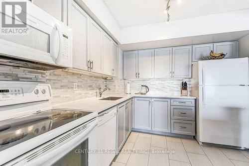 417 - 1000 Cedarglen Gate, Mississauga, ON - Indoor Photo Showing Kitchen With Upgraded Kitchen