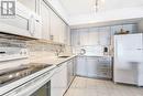 417 - 1000 Cedarglen Gate, Mississauga, ON  - Indoor Photo Showing Kitchen With Upgraded Kitchen 