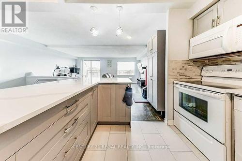 417 - 1000 Cedarglen Gate, Mississauga, ON - Indoor Photo Showing Kitchen