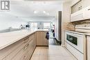 417 - 1000 Cedarglen Gate, Mississauga, ON  - Indoor Photo Showing Kitchen 