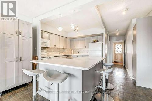 417 - 1000 Cedarglen Gate, Mississauga, ON - Indoor Photo Showing Kitchen