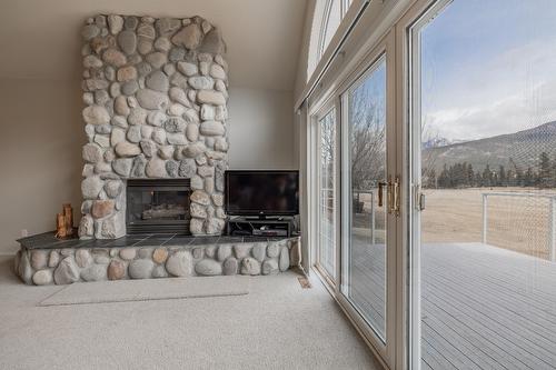 5214 Riverside Drive, Fairmont Hot Springs, BC - Indoor With Fireplace