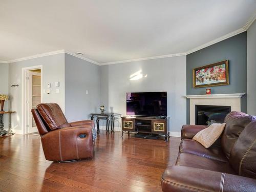 Salon - 4-320 Rue Cherrier, Saint-Jérôme, QC - Indoor Photo Showing Living Room With Fireplace