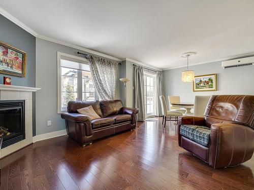 Salon - 4-320 Rue Cherrier, Saint-Jérôme, QC - Indoor Photo Showing Living Room With Fireplace