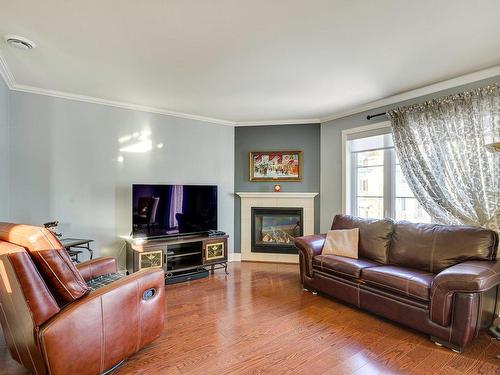 Salon - 4-320 Rue Cherrier, Saint-Jérôme, QC - Indoor Photo Showing Living Room With Fireplace