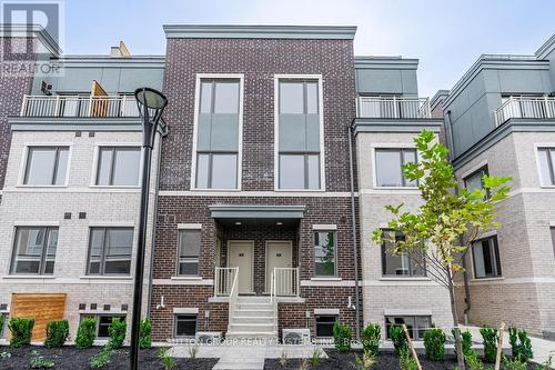 199 - 10 Lloyd Janes Lane, Toronto, ON - Outdoor With Balcony With Facade