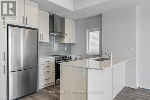 199 - 10 Lloyd Janes Lane, Toronto, ON - Indoor Photo Showing Kitchen With Stainless Steel Kitchen With Double Sink With Upgraded Kitchen