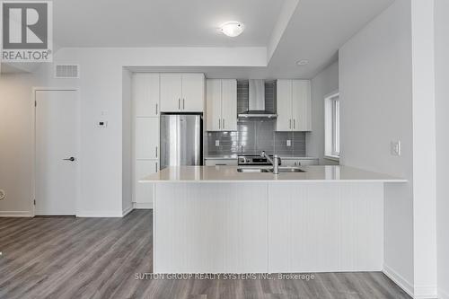 199 - 10 Lloyd Janes Lane, Toronto, ON - Indoor Photo Showing Kitchen With Stainless Steel Kitchen With Double Sink