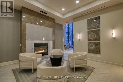 1002 - 59 Annie Craig Drive, Toronto, ON - Indoor With Fireplace