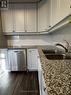 125 - 8175 Britannia Road, Milton, ON  - Indoor Photo Showing Kitchen With Double Sink 