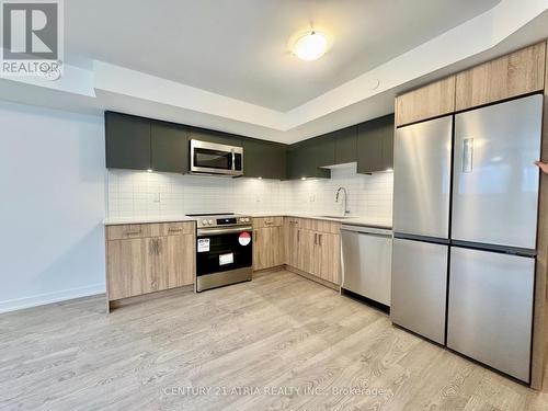 22 Deep Roots Terrace, Toronto, ON - Indoor Photo Showing Kitchen With Stainless Steel Kitchen With Upgraded Kitchen