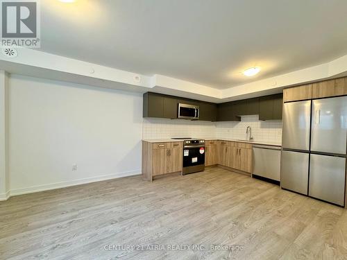 22 Deep Roots Terrace, Toronto, ON - Indoor Photo Showing Kitchen With Stainless Steel Kitchen