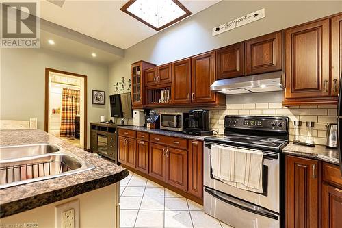 115 King Street W, North Bay, ON - Indoor Photo Showing Kitchen With Double Sink