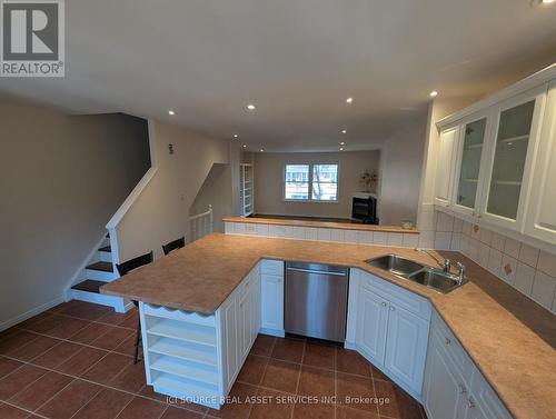 17 Douville Court, Toronto, ON - Indoor Photo Showing Kitchen With Double Sink