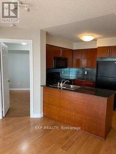 1613 - 310 Burnhamthorpe Road W, Mississauga, ON - Indoor Photo Showing Kitchen With Double Sink