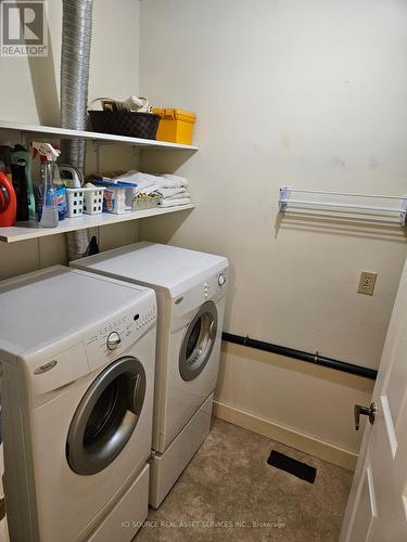 504 - 200 East Street S, Kawartha Lakes, ON - Indoor Photo Showing Laundry Room