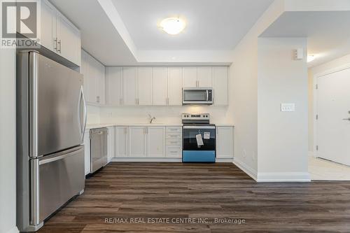 127 - 1577 Rose Way, Milton, ON - Indoor Photo Showing Kitchen With Upgraded Kitchen