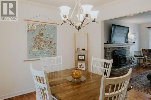 12 Hawker Crescent, Gander, NL - Indoor Photo Showing Dining Room With Fireplace