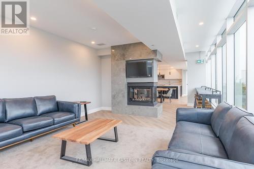 505 - 195 Hunter Street E, Peterborough (Ashburnham), ON - Indoor Photo Showing Living Room With Fireplace