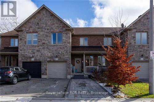 135 Samuel Drive, Wellington North (Arthur), ON - Outdoor With Facade