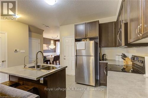 135 Samuel Drive, Wellington North (Arthur), ON - Indoor Photo Showing Kitchen With Double Sink