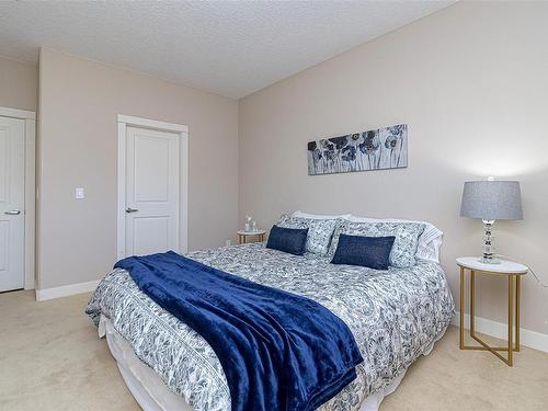 401-2710 Jacklin Rd, Langford, BC - Indoor Photo Showing Bedroom