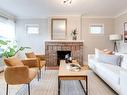 4 Dunkirk Rd, Toronto, ON  - Indoor Photo Showing Living Room With Fireplace 